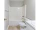 A clean bathroom with a shower and tub at 7623 Mcgillicuty Dr, Union City, GA 30291