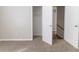 A bedroom with plush carpeting and a closet at 7623 Mcgillicuty Dr, Union City, GA 30291