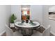 Cozy dining area with seating for four, adjacent to the kitchen space at 7623 Mcgillicuty Dr, Union City, GA 30291
