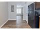 A kitchen view featuring sleek, modern flooring and contemporary appliances at 7623 Mcgillicuty Dr, Union City, GA 30291