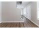 Bright living room with wood-look flooring and neutral paint color at 7623 Mcgillicuty Dr, Union City, GA 30291