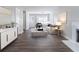 Staged living room with modern furniture and hardwood floors at 7623 Mcgillicuty Dr, Union City, GA 30291