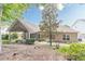 Charming home features a backyard patio perfect for outdoor entertaining and enjoying peaceful relaxation at 1657 Williams Mill Way, Dacula, GA 30019