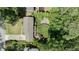 An aerial view of a home with a well-maintained lawn and landscaped backyard at 1890 Silvastone Dr, Decatur, GA 30033