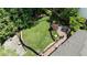 Aerial view showcasing a spacious backyard with basketball court, patio, and play area at 1890 Silvastone Dr, Decatur, GA 30033