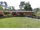 Well-maintained backyard with a patio and lush greenery, offering a serene retreat at 1890 Silvastone Dr, Decatur, GA 30033