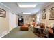 Finished basement with carpet, a couch, TV, and double door closet at 1890 Silvastone Dr, Decatur, GA 30033