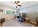 Charming bedroom featuring a bunk bed, carpet, and natural light from the window at 1890 Silvastone Dr, Decatur, GA 30033