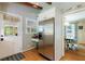 Spacious kitchen with stainless steel refrigerator, and dining area at 1890 Silvastone Dr, Decatur, GA 30033