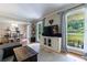 Open-concept living room with large windows providing natural light and views of the outdoors at 1890 Silvastone Dr, Decatur, GA 30033