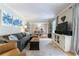 Bright and airy living room showcasing a comfortable sectional sofa and open dining area at 1890 Silvastone Dr, Decatur, GA 30033