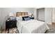 Cozy bedroom with a queen-sized bed, side tables, decor, and warm lighting, creating a restful ambiance at 2376 Cross Nw St, Atlanta, GA 30318