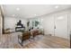 Inviting living room with neutral decor, stylish furniture, and large windows offering abundant natural light at 2376 Cross Nw St, Atlanta, GA 30318
