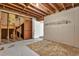 Unfinished basement with exposed ceiling and concrete floor at 3189 Glen Hollow Dr, Rex, GA 30273
