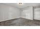 Cozy bedroom featuring neutral walls, plush carpeting, and classic ceiling light at 3189 Glen Hollow Dr, Rex, GA 30273