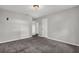 Bedroom with neutral paint, soft carpeting, and a bright ceiling light at 3189 Glen Hollow Dr, Rex, GA 30273