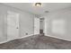 Neutral bedroom with carpet and ample closet space at 3189 Glen Hollow Dr, Rex, GA 30273