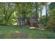 Beautiful two-story home surrounded by lush greenery with a well-maintained lawn and inviting curb appeal at 3189 Glen Hollow Dr, Rex, GA 30273