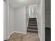 Inviting foyer with stairs and tile floor, offering a welcoming entrance to the home at 3189 Glen Hollow Dr, Rex, GA 30273