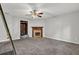 Living room featuring a fireplace, carpeting and neutral paint color at 3189 Glen Hollow Dr, Rex, GA 30273