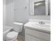 This bathroom offers a shower-tub combination and vanity with sink and mirror at 6750 Blackstone Pl # 6, Mableton, GA 30126