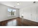 The bedroom is bright and features hardwood floors and a door to the bathroom at 6750 Blackstone Pl # 6, Mableton, GA 30126