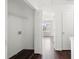 This hallway features a large closet and doorway leading to a room with a window at 6750 Blackstone Pl # 6, Mableton, GA 30126