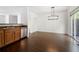 Kitchen features hardwood floors, stainless appliances, and a breakfast bar at 6750 Blackstone Pl # 6, Mableton, GA 30126