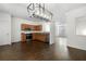 Kitchen featuring stainless appliances, dark hardwood floors, and bright lighting at 6750 Blackstone Pl # 6, Mableton, GA 30126