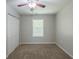 Bedroom with carpet, a window, and a closet at 1808 Arkose Se Dr, Atlanta, GA 30316