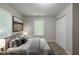 Bedroom staged with neutral decor and comfortable furnishings at 1808 Arkose Se Dr, Atlanta, GA 30316