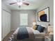 Bedroom staged with neutral decor and comfortable furnishings at 1808 Arkose Se Dr, Atlanta, GA 30316