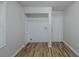 A laundry area with storage, a window, and an exterior door at 1808 Arkose Se Dr, Atlanta, GA 30316