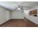 Open-concept living room with wood-look flooring and view into kitchen area at 1808 Arkose Se Dr, Atlanta, GA 30316