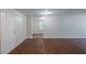 Spacious living area featuring new paint and wood-look flooring at 1808 Arkose Se Dr, Atlanta, GA 30316