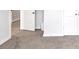 A bedroom with new, clean carpet and freshly painted baseboards at 201 Kingfisher Walk, Covington, GA 30014