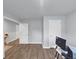 Versatile room with wood floors, suitable for a home office setup at 201 Kingfisher Walk, Covington, GA 30014