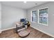 Cozy home office space with wood floors and ample natural light at 201 Kingfisher Walk, Covington, GA 30014