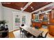 Bright dining area featuring french doors, a view of the back yard, and access to the kitchen at 3539 Eaglerock Dr, Doraville, GA 30340
