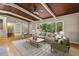 Spacious living room with hardwood floors, large window, and comfortable furnishings at 3539 Eaglerock Dr, Doraville, GA 30340