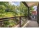 Relaxing balcony offering views of lush greenery, creating a serene outdoor space for entertaining or unwinding at 399 Pratt Se Dr # 910, Atlanta, GA 30315