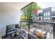 Private balcony with comfortable seating and views of lush greenery, ideal for relaxing at 399 Pratt Se Dr # 910, Atlanta, GA 30315