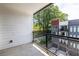 Balcony overlooking lush landscaping and neighboring modern townhomes at 399 Pratt Se Dr # 910, Atlanta, GA 30315