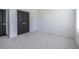 Bright and spacious bedroom featuring plush carpet, closet doors, and large windows, providing ample natural light and a calming atmosphere at 399 Pratt Se Dr # 910, Atlanta, GA 30315
