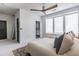 Spacious bedroom with a large bed, an ensuite bathroom, and windows providing ample natural light at 399 Pratt Se Dr # 910, Atlanta, GA 30315