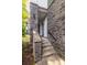 Brick exterior and stairway lead to a modern townhome, enhancing its charm and accessibility at 399 Pratt Se Dr # 910, Atlanta, GA 30315