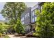 Contemporary townhome with modern facade, landscaped entrance, offering an inviting and stylish living experience at 399 Pratt Se Dr # 910, Atlanta, GA 30315