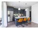 Stylish kitchen featuring stainless steel appliances, a center island, and ample storage at 399 Pratt Se Dr # 910, Atlanta, GA 30315