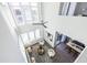 Open-concept living room with soaring ceilings, large windows and stylish furnishings at 399 Pratt Se Dr # 910, Atlanta, GA 30315