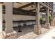 Outdoor kitchen with brick pillars, countertops, sink and tables at 399 Pratt Se Dr # 910, Atlanta, GA 30315